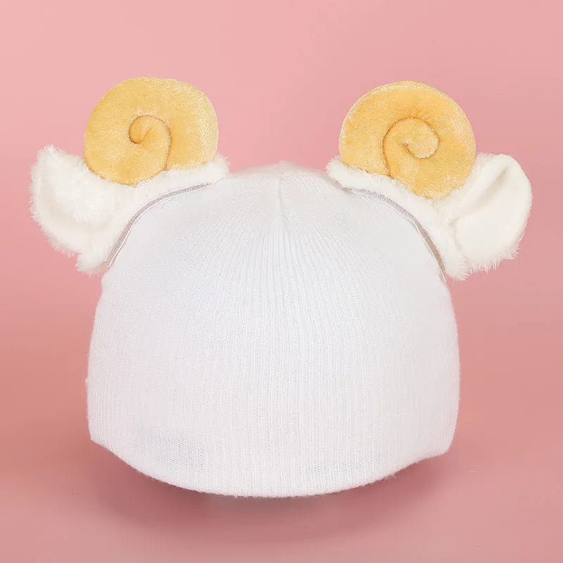 Child's plush cartoon character helmet cover and hat set in soft fabric, shown in medium size.