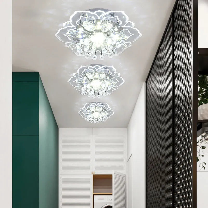 Modern crystal ceiling lamp with flower-shaped shade and LED light in warm white, white, or colour options.