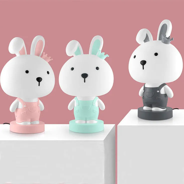 Cartoon style animal table lamp with plastic shade in random colour variation showing bear cattle rabbit or tiger design