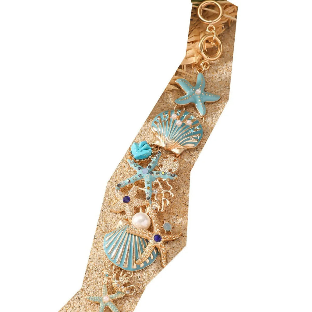 Alloy boat anchor and starfish rhinestone bracelet for women in turquoise, coral red, or coral blue.