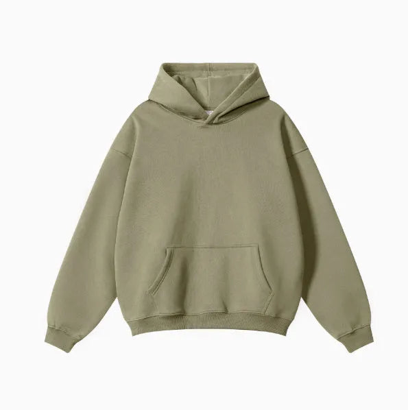 A loose-fitting men's cotton hooded sweater in a pullover style on a hanger.
