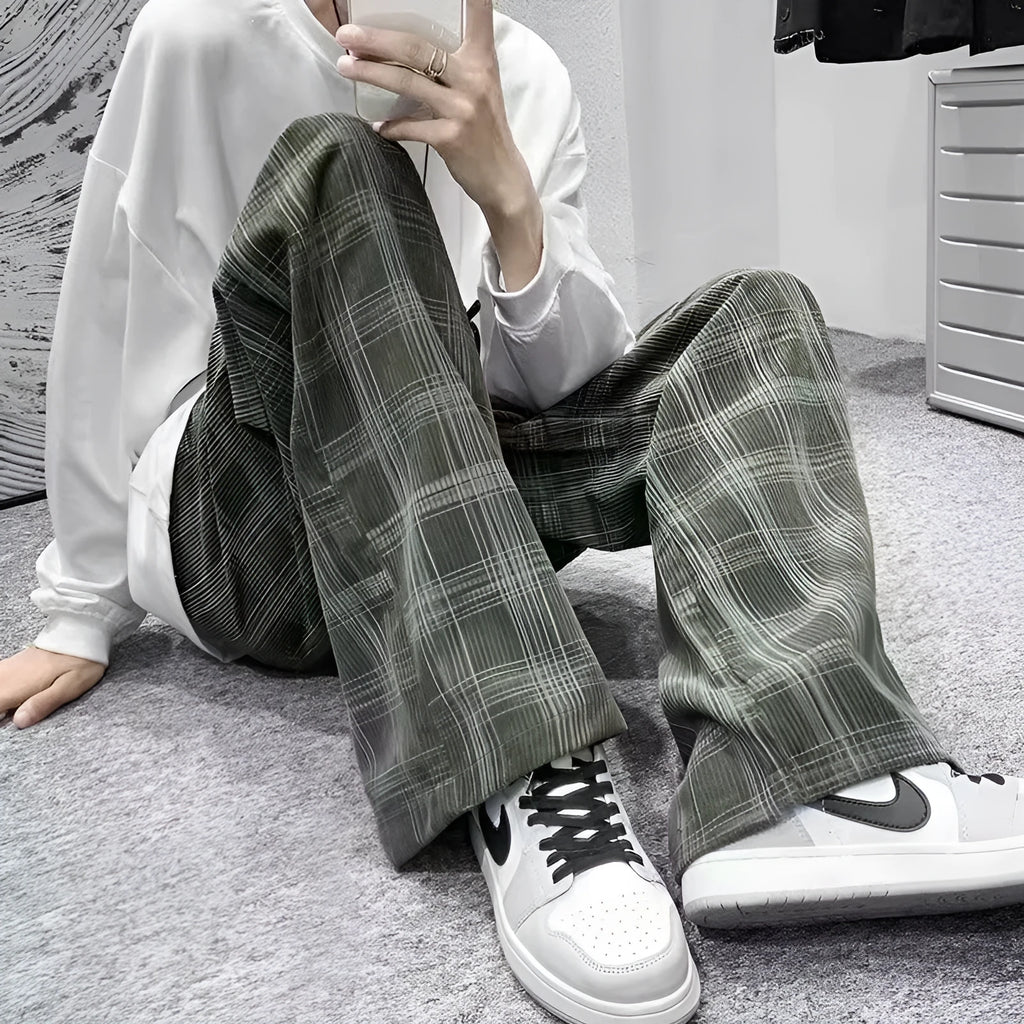 Men's black and green plaid loose fit straight leg trousers with mid waist design