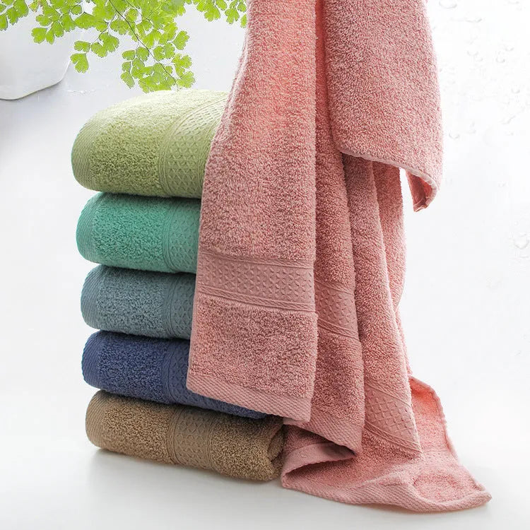 Thickened cotton blend bath beach towel showing colour options including green, blue, brown, and pink