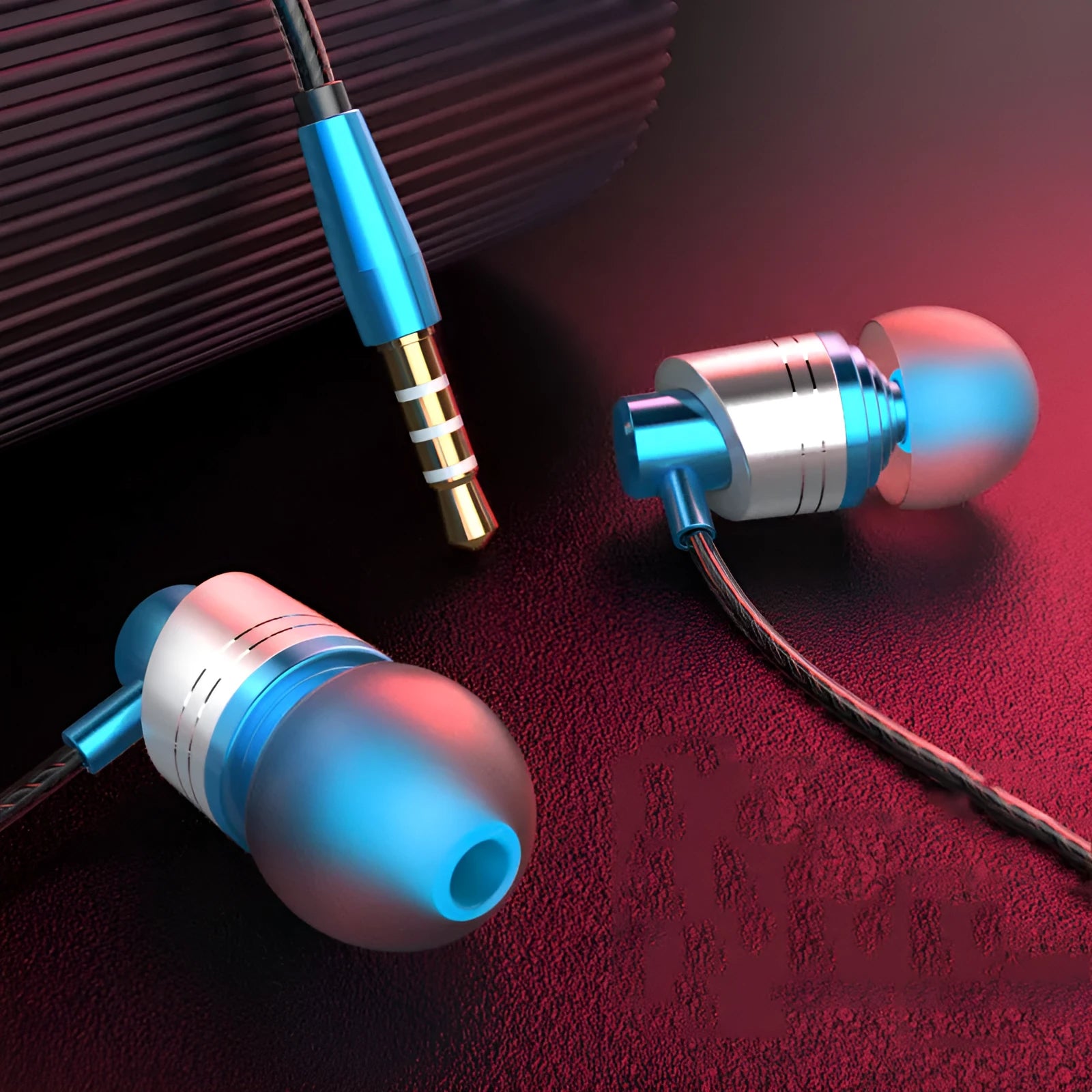 Black wired in-ear earphones with a 3.5mm plug, silicone earpieces, and a built-in microphone on the cable.