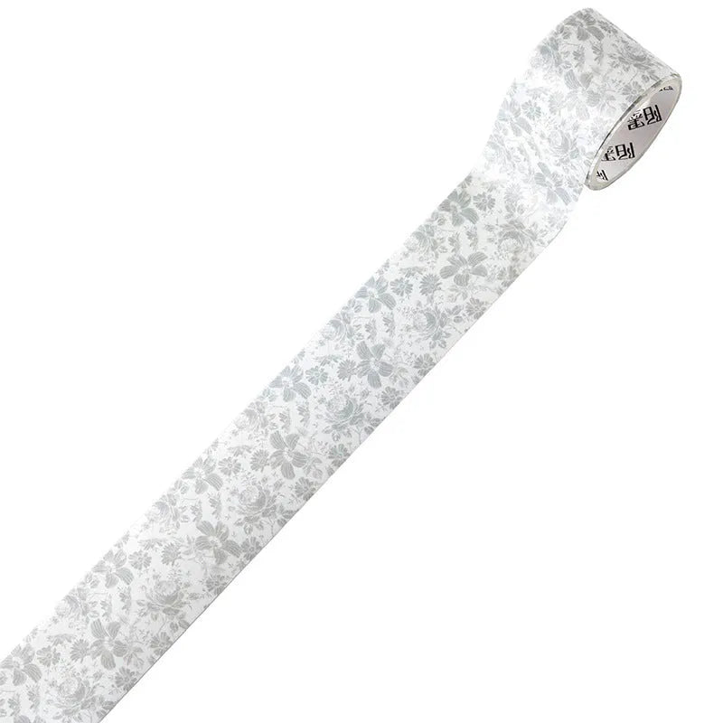 Roll of Japanese paper floral washi tape with vintage watercolour designs for journaling and craft projects