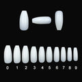 Clear transparent ABS false nails in a pack of 500 pieces, showing French tip design and range of sizes.