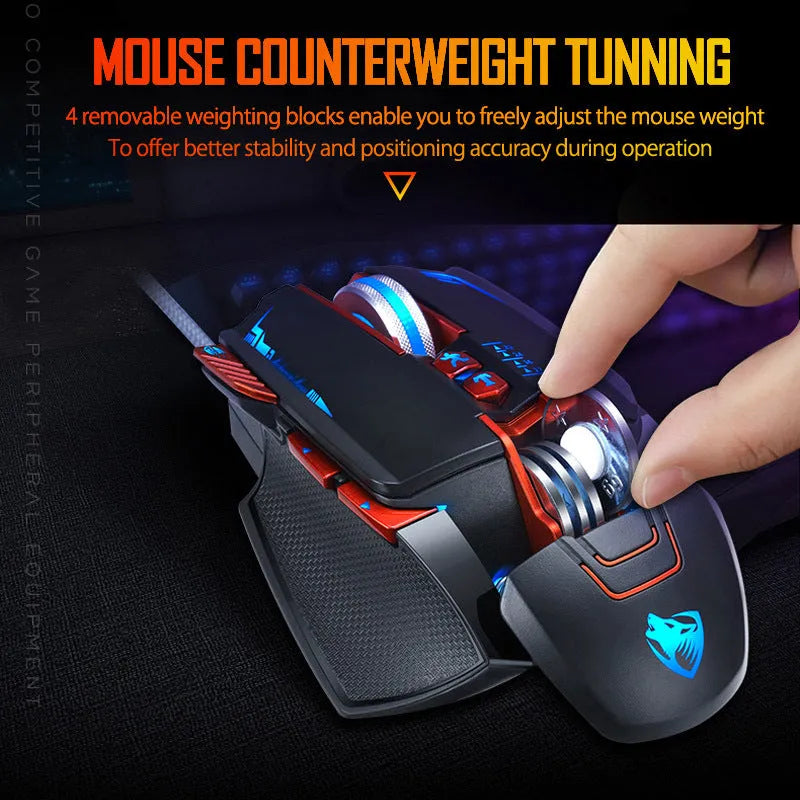 Black Thunder Wolf V9 wired gaming mouse with six buttons on a desk