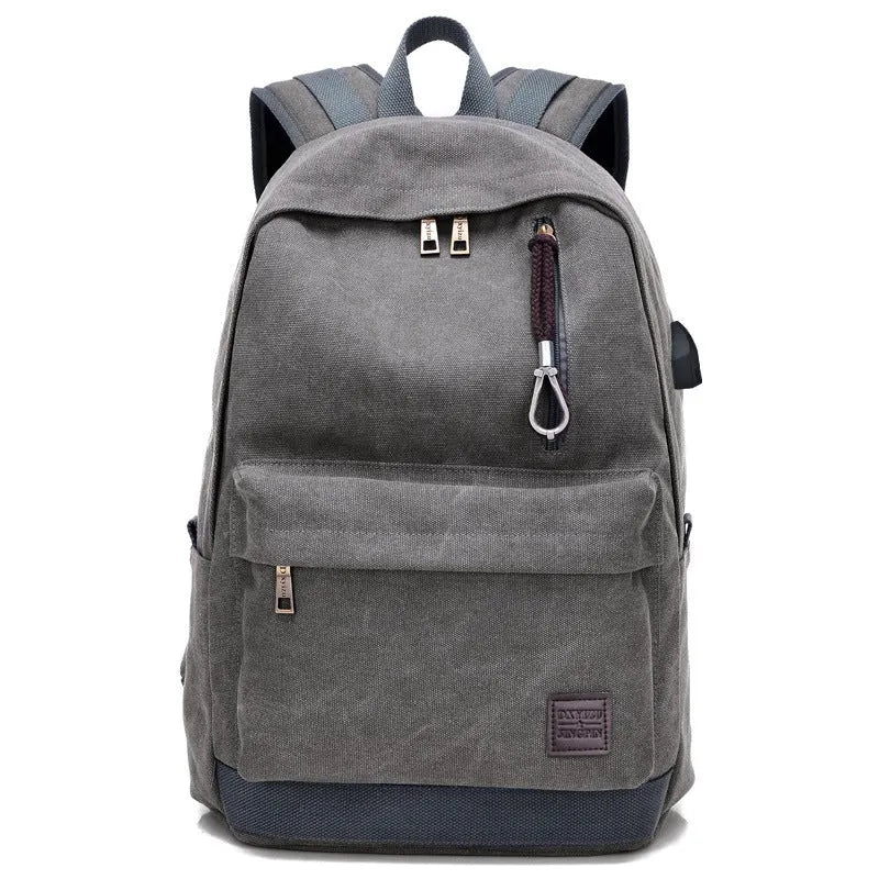 Canvas backpack with external USB charging port showing coffee colour option with multiple compartments.