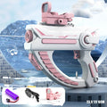 Blue electric water gun toy with USB charging cable on a sandy beach