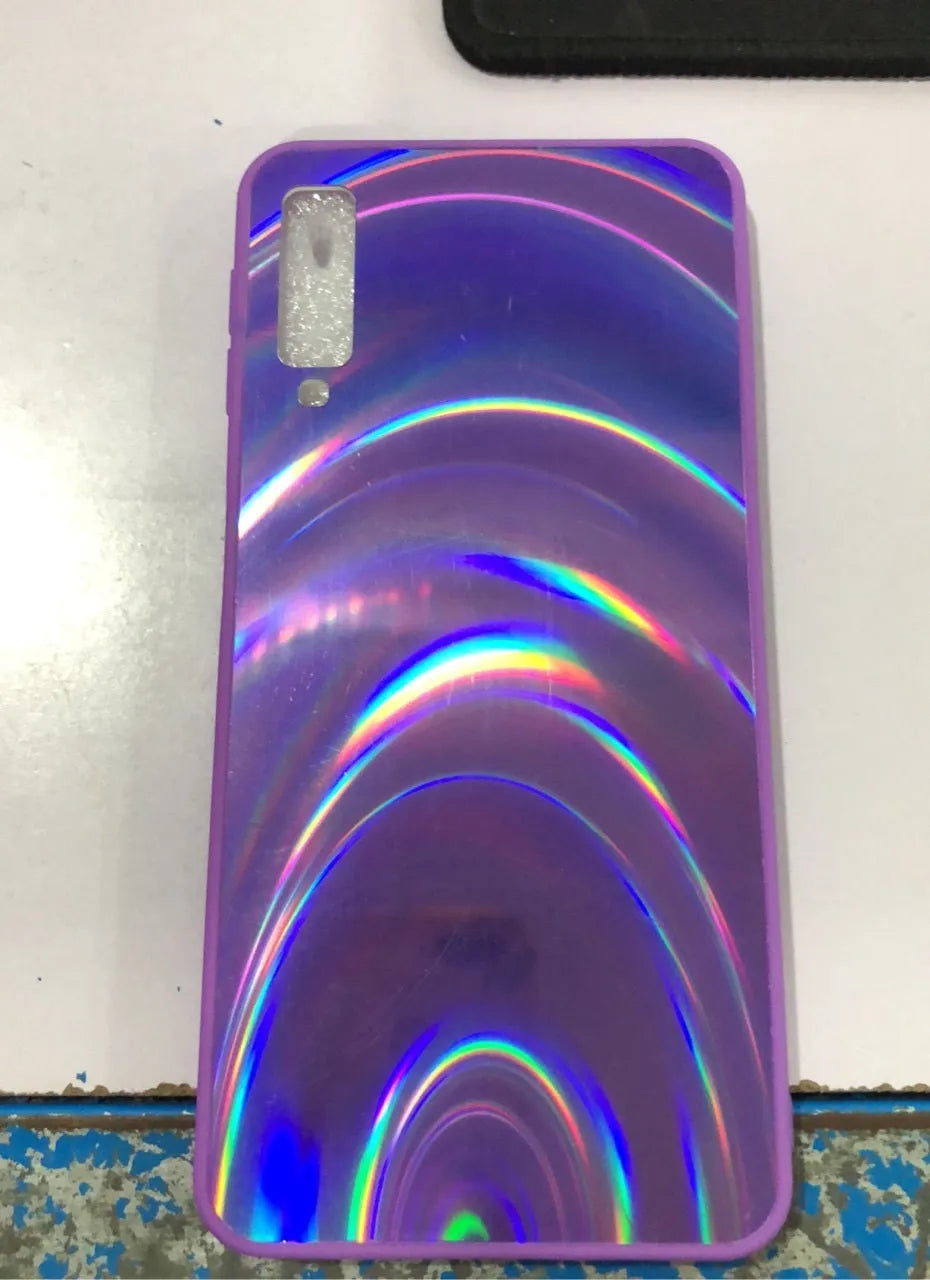 Marble pattern shockproof silicone phone case for Samsung Galaxy models on a table.