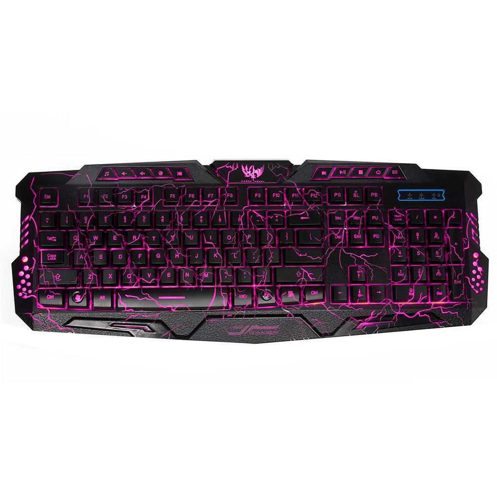 Black backlit game keyboard with crack design, 3-colour adjustable backlight, and anti-slip pads on a desk