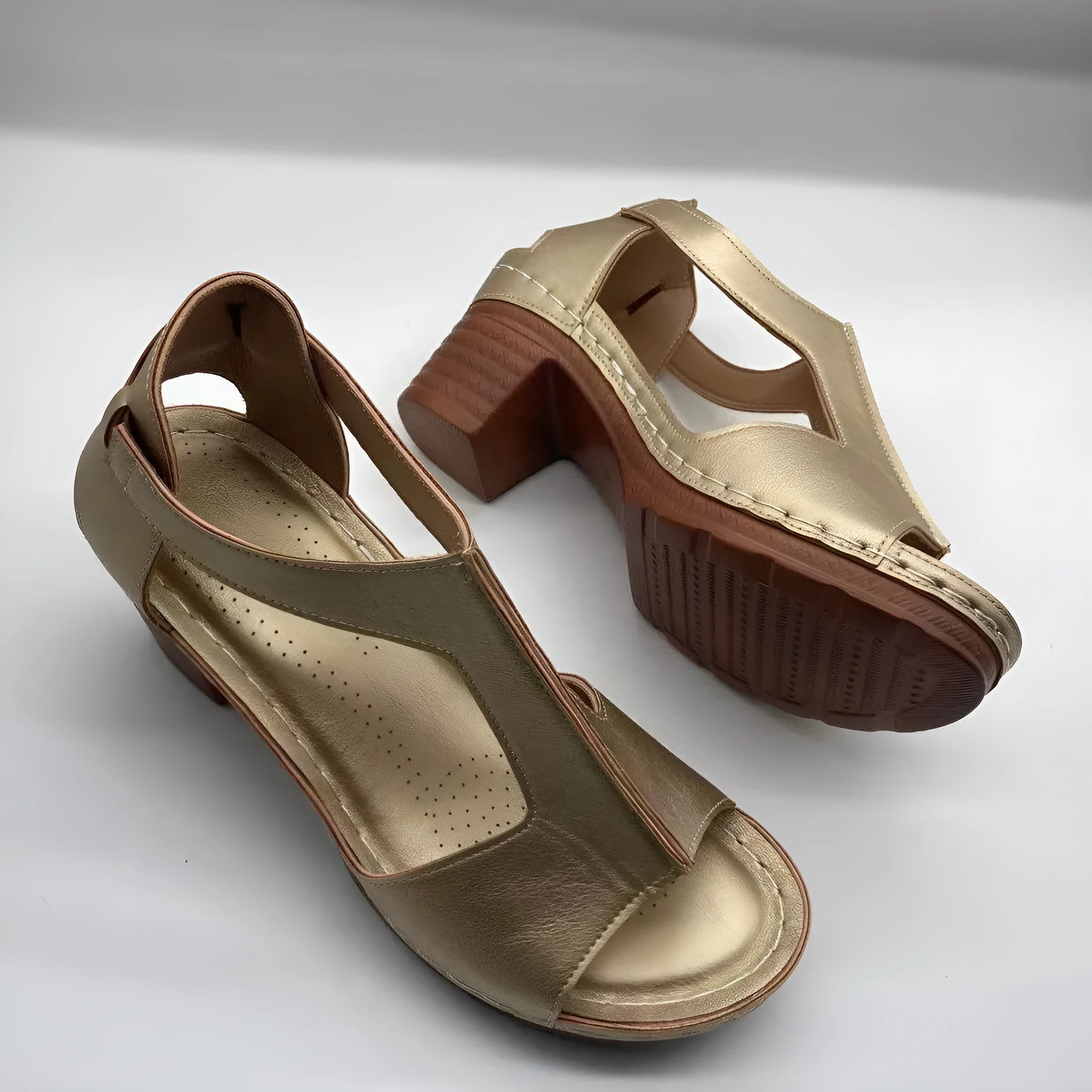 Women's peep toe wedge sandal with buckle on low heel, open fish mouth toe, in light brown