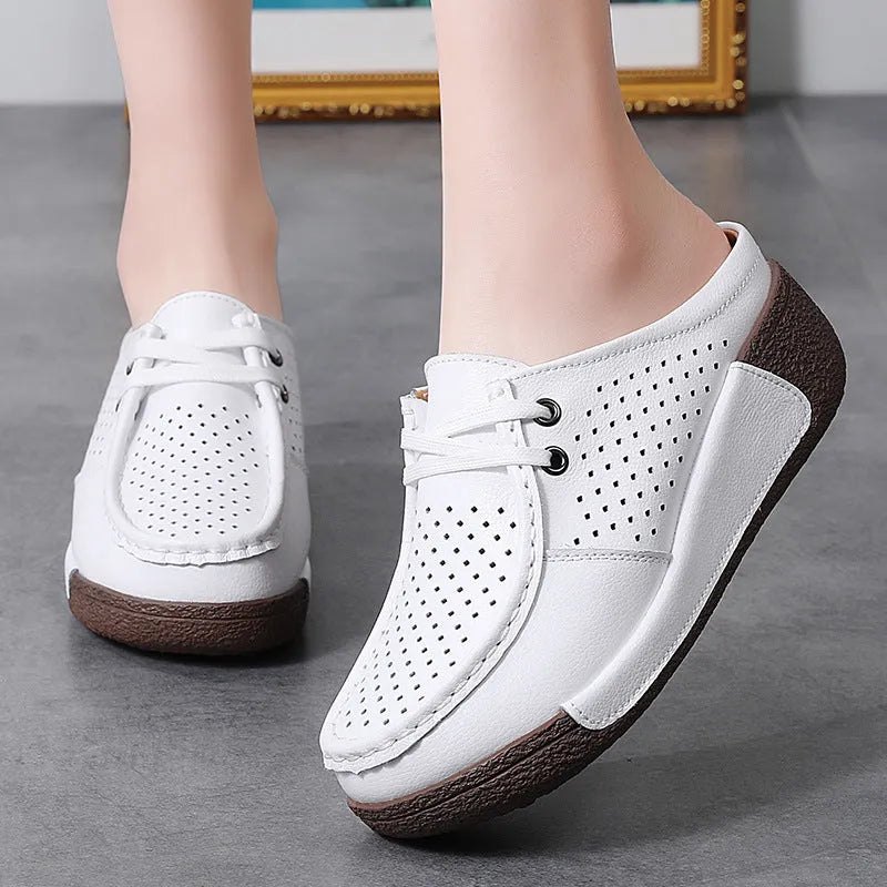 Plus size women's genuine leather platform slippers in black with round toe and hollow-out wedge sole