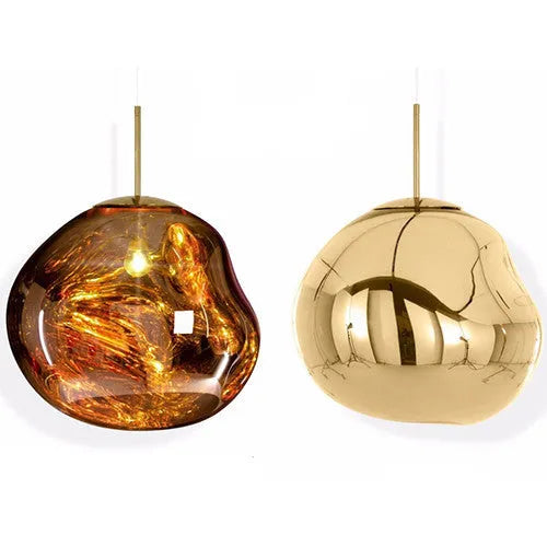 A modern irregular shaped glass chandelier with a Nordic design in a gold finish, hanging from a ceiling.