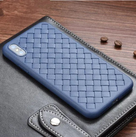 Luxury grid weaving protective case for iPhone on a table, showing raised lips and colour options.