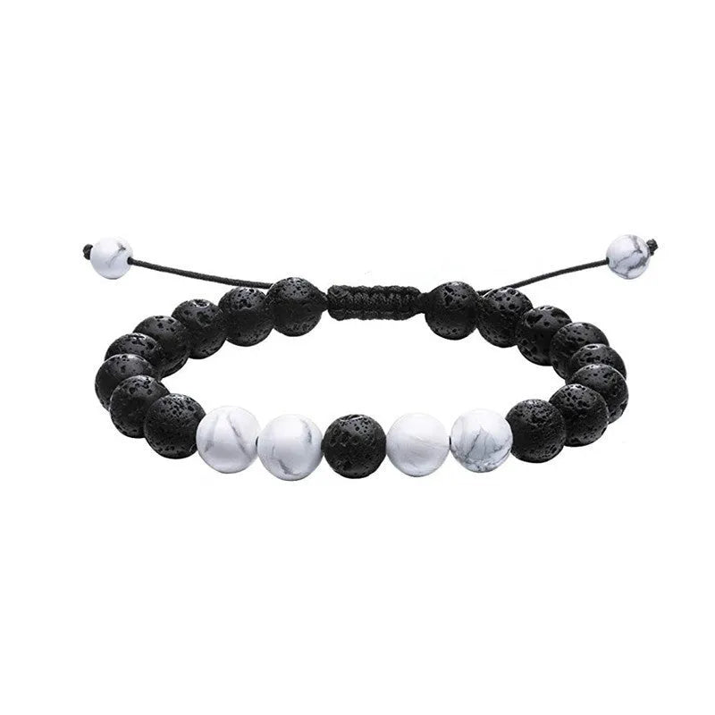 Geometric agate couple bracelets in tiger eye and matte black beads.