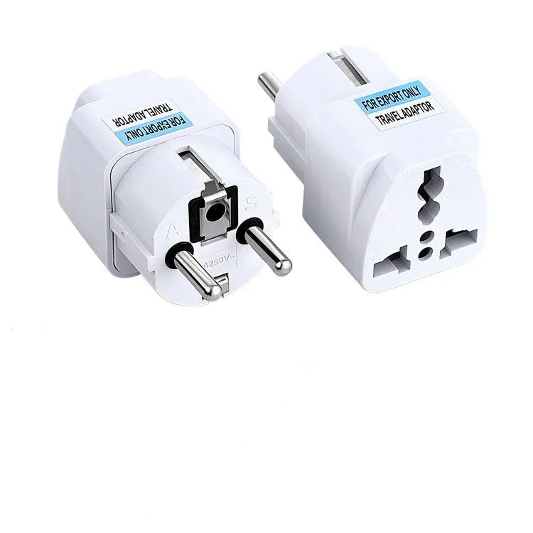 Multi country conversion plug in white with AU EU German UK and US style options on a neutral background
