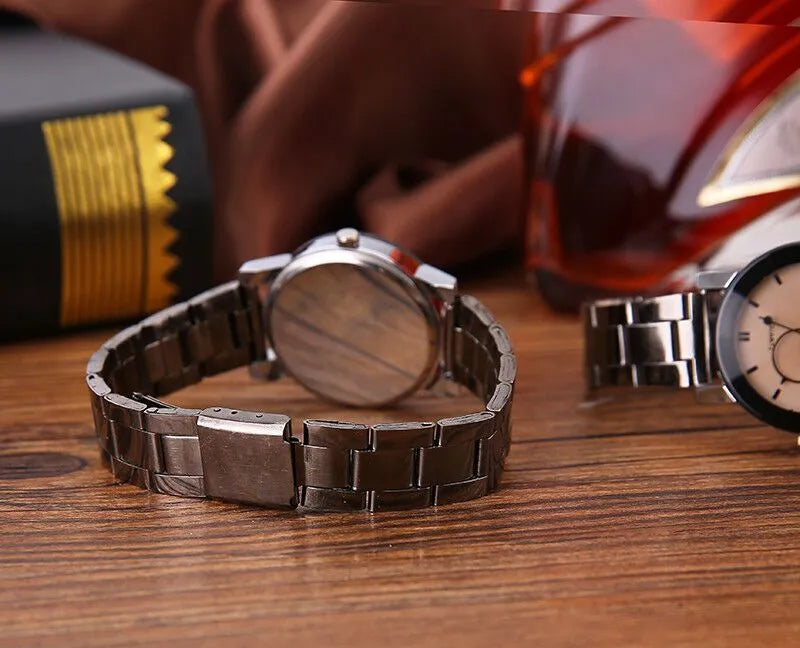 Black steel strap quartz analogue watch with metal case and glass mirror for men and women