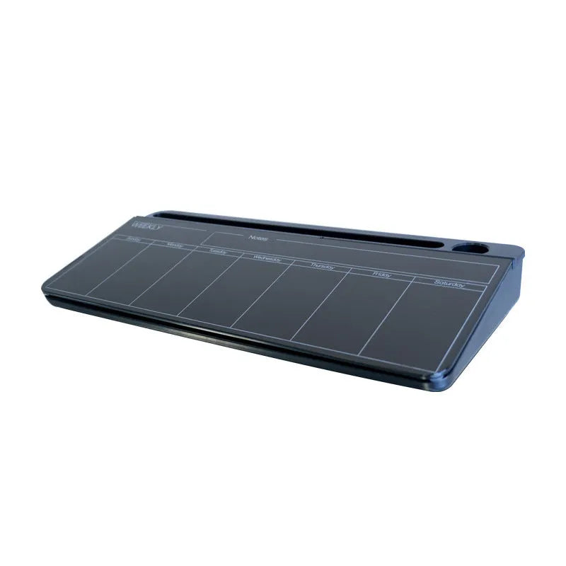 Table top glass whiteboard 18x40cm in black finish on a desk with markers