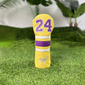 Set of four yellow PU golf club head covers including a square putter cover and iron covers on a golf bag.