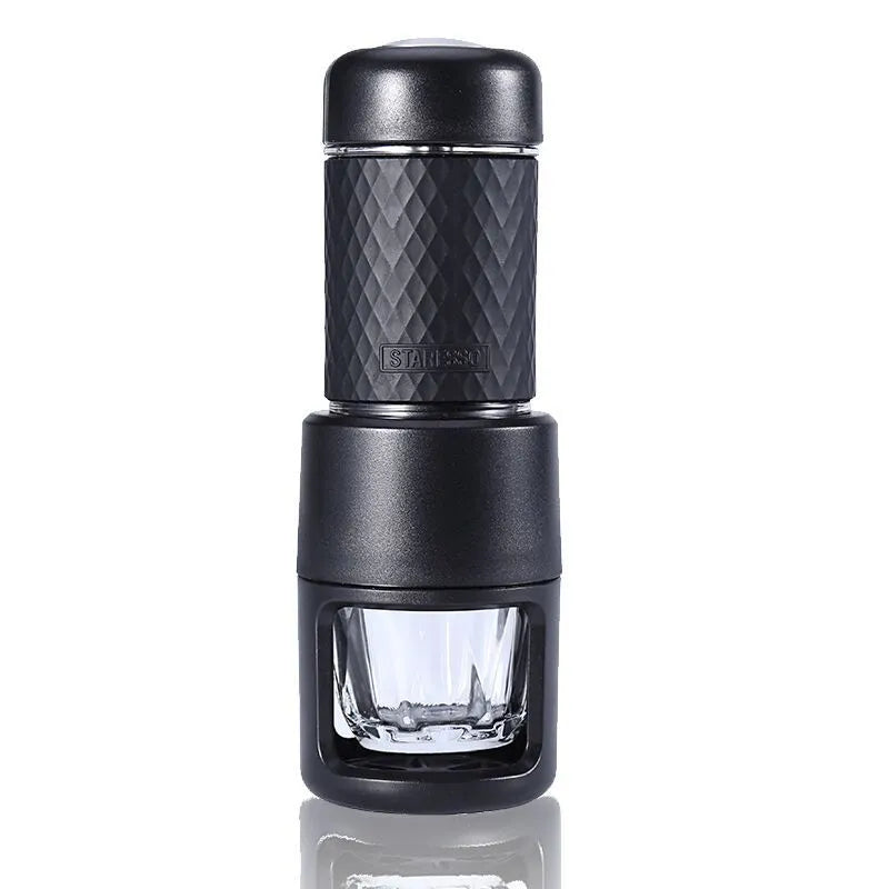 Portable manual espresso coffee machine in multiple colours showing compact design