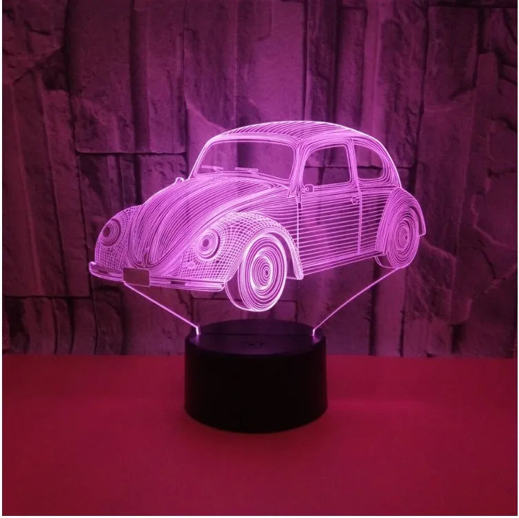 Black 3D acrylic LED table lamp with touch and remote control on wooden desk