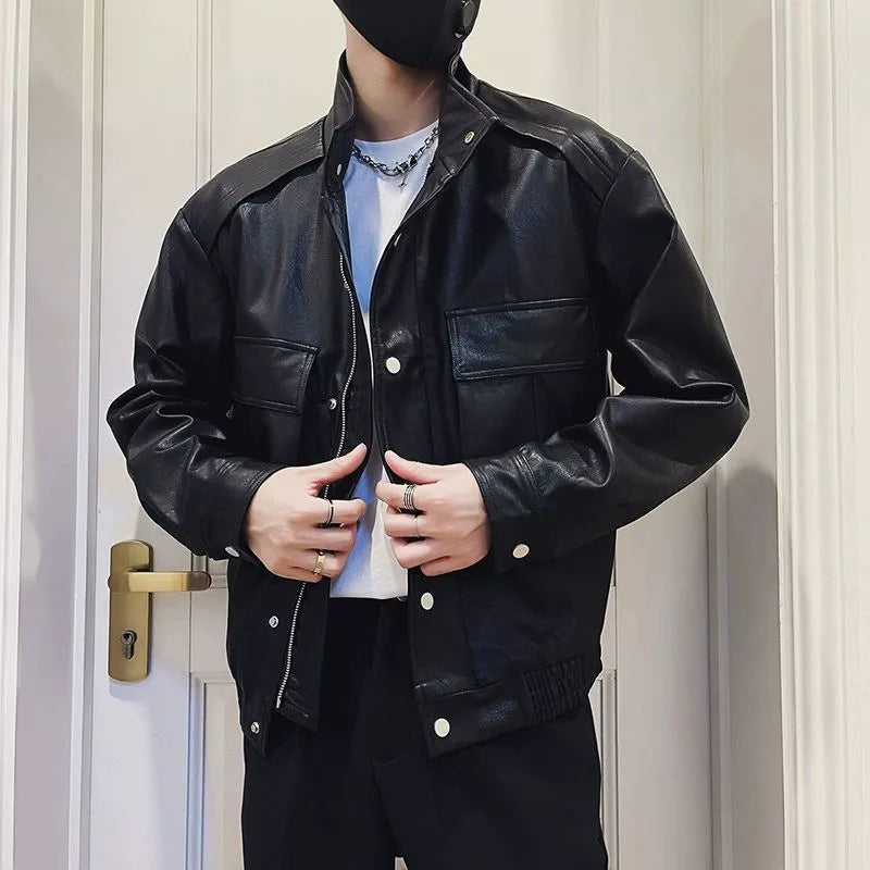 Men's black Korean-style PU leather pilot jacket with side pockets on a hanger.
