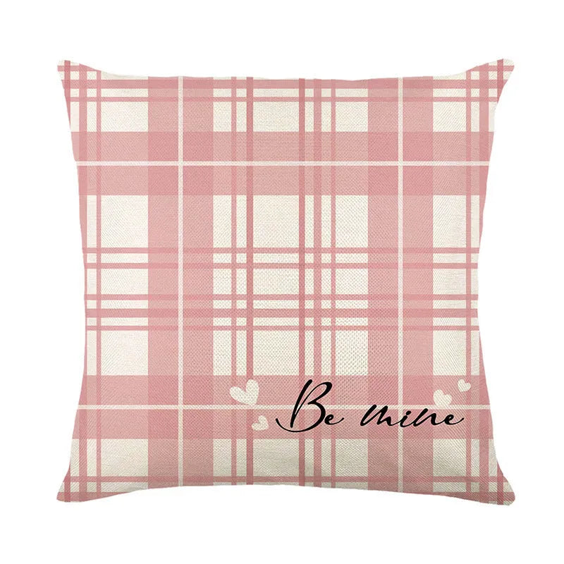 Square plaid and heart pattern decorative pillow cover with visible zip, shown in red and white colourway.