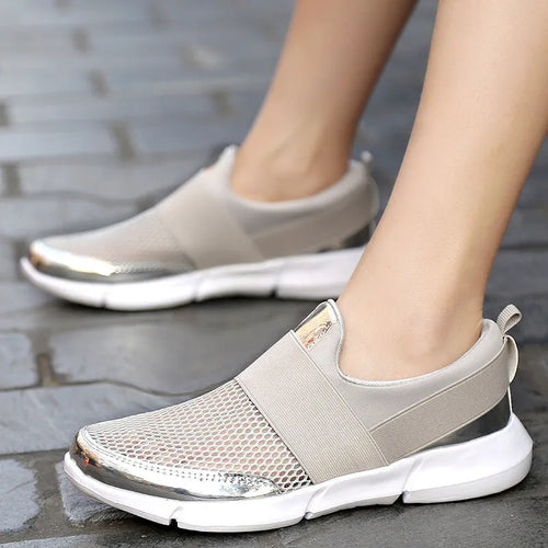 Blue, black, and grey women's lightweight sneakers with mesh lining and low-tube design.