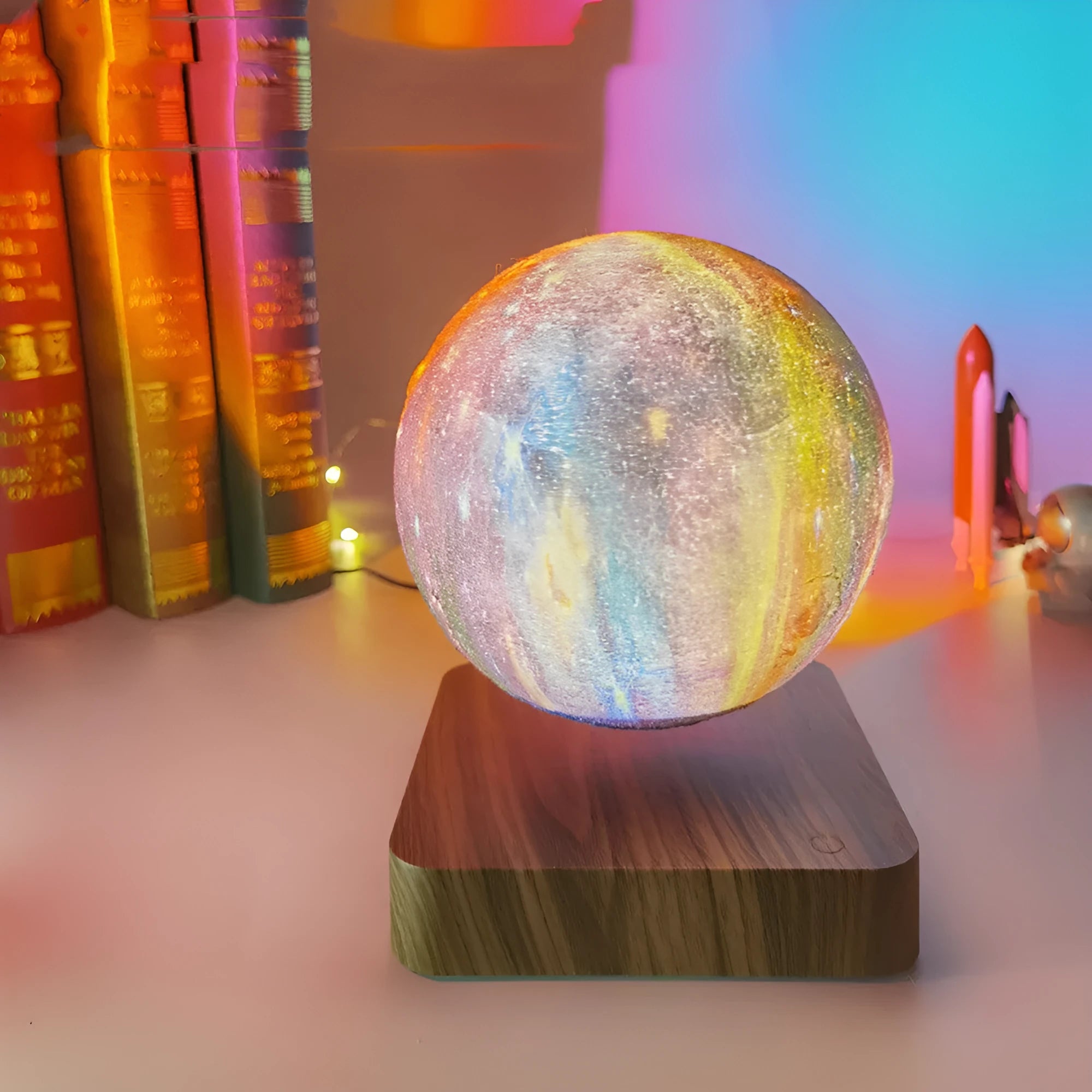 Walnut-colour base with a floating galaxy moon lamp levitating above it, showing starry sky details.