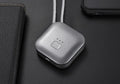 Pink portable USB air purifier necklace with charging cable showing compact wearable design