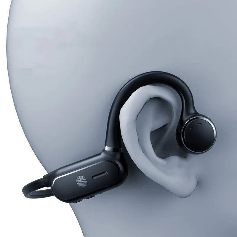 Black air conduction Bluetooth wireless earphone with titanium wire frame shown hanging over a pair of glasses.
