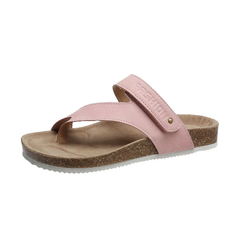 Blue thick-soled flat toe ring flip-flops on a white background.