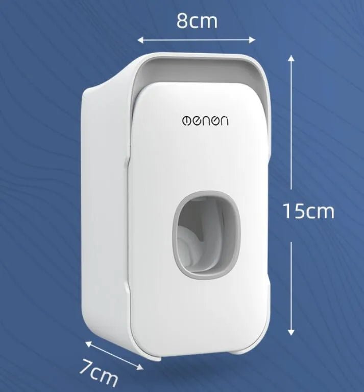 Blue automatic toothpaste dispenser made of ABS plastic mounted on a bathroom wall.