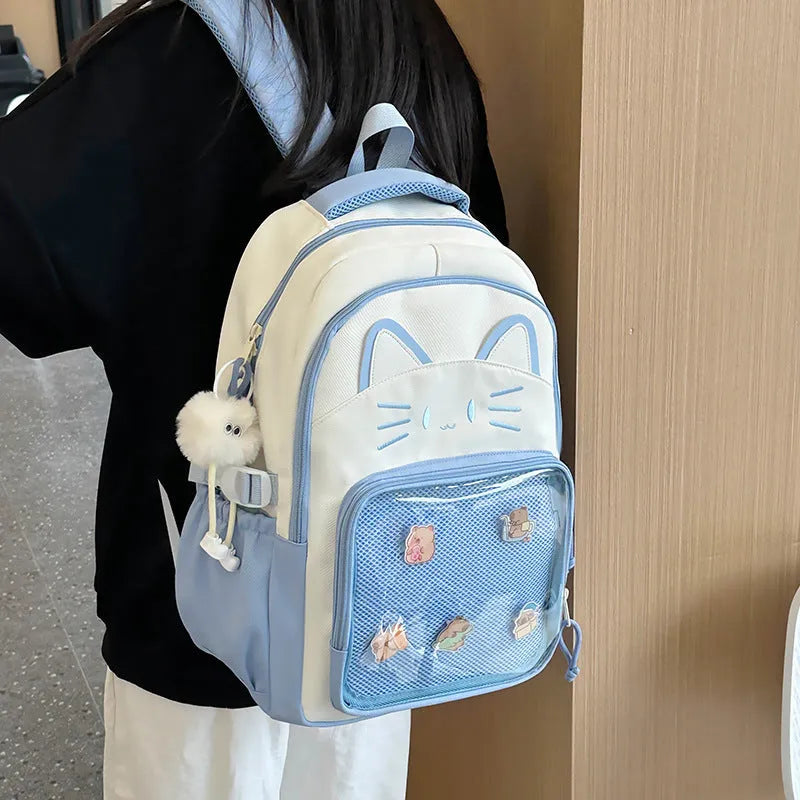 Korean cartoon backpack in multiple colours with curved shoulder straps and badge pendant options