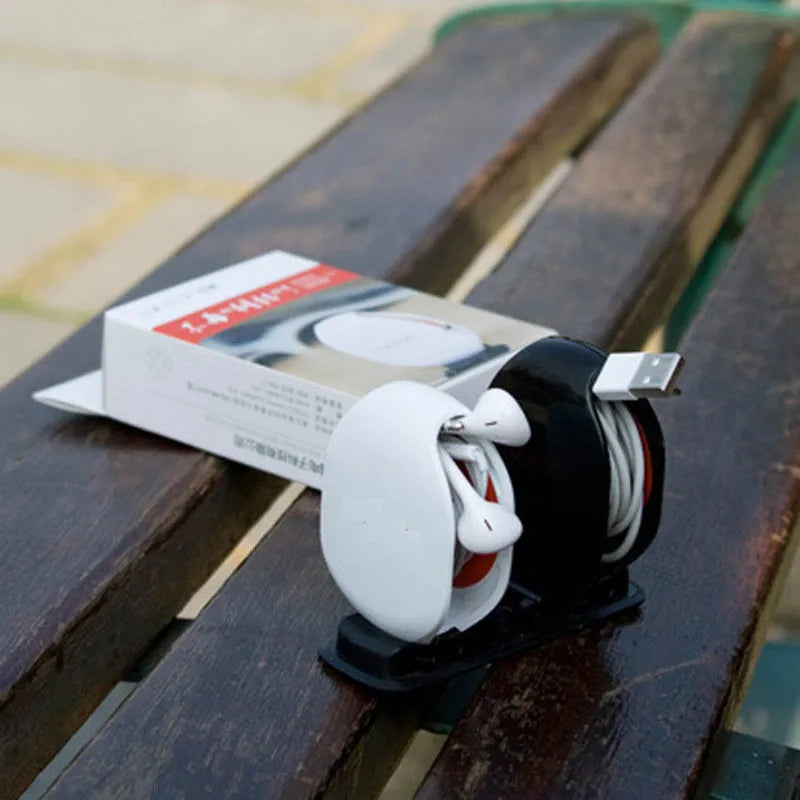 Automatic cable winder retractor in PC ABS plastic showing compact size and colour options.