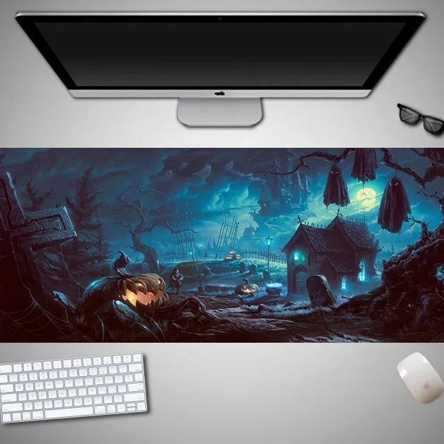 Large Halloween patterned gaming mouse pad on a desk showing non-slip rubber base and extra-long design.