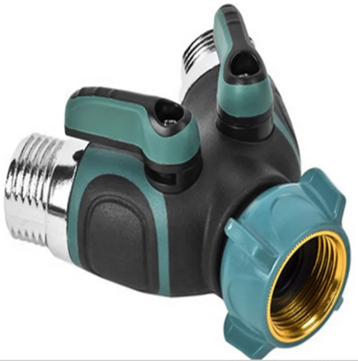 Green plastic Y type double-pass garden hose splitter with two outlets and brass-coloured inlet