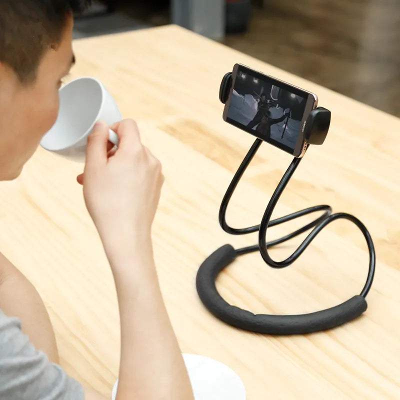 Baseus flexible 360-degree adjustable phone holder with shockproof bubble support on a grey background.
