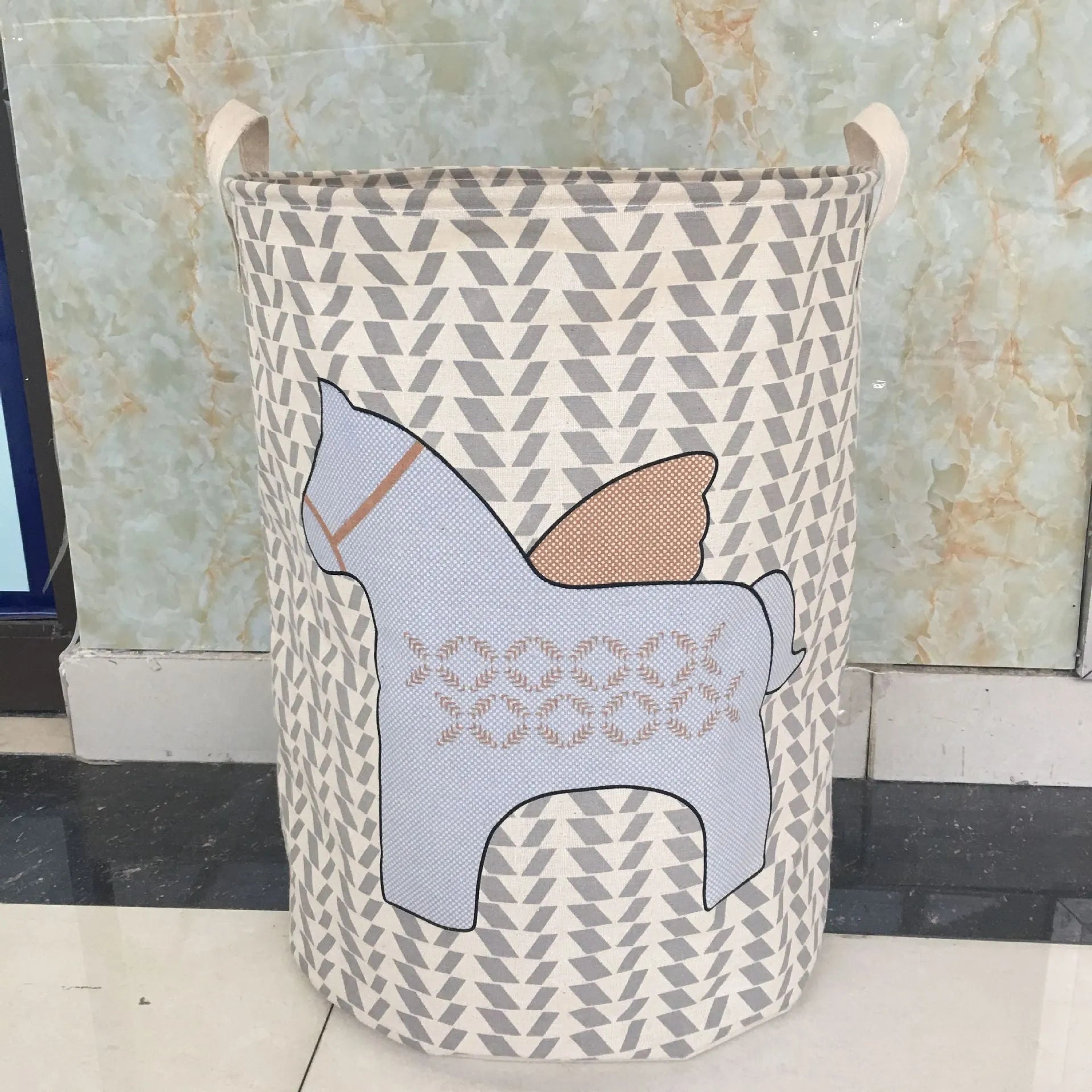 Cotton linen storage bucket with five-pointed star and horse design in a home setting