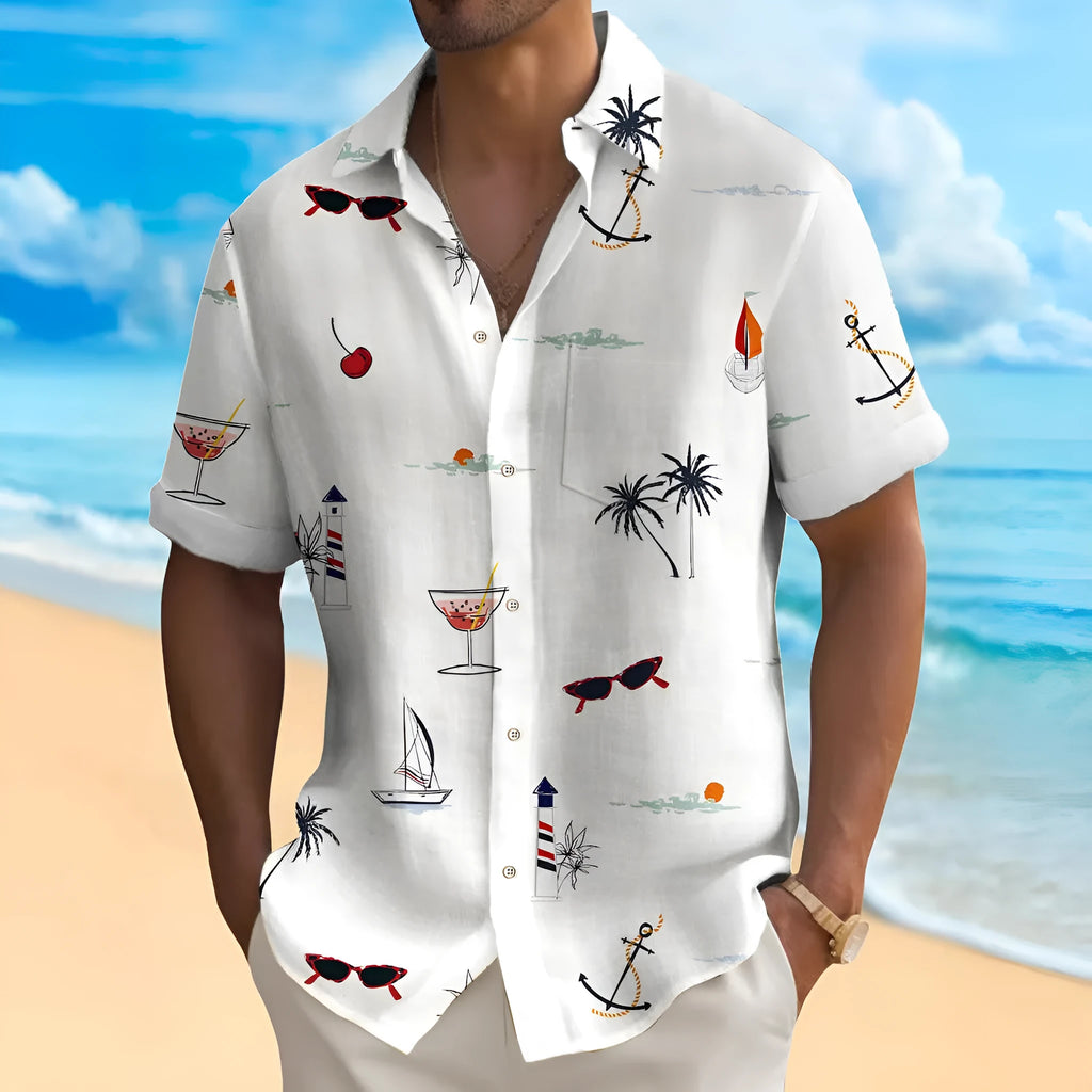 Man wearing a colourful digitally printed Hawaiian shirt with a loose fit and short sleeves.