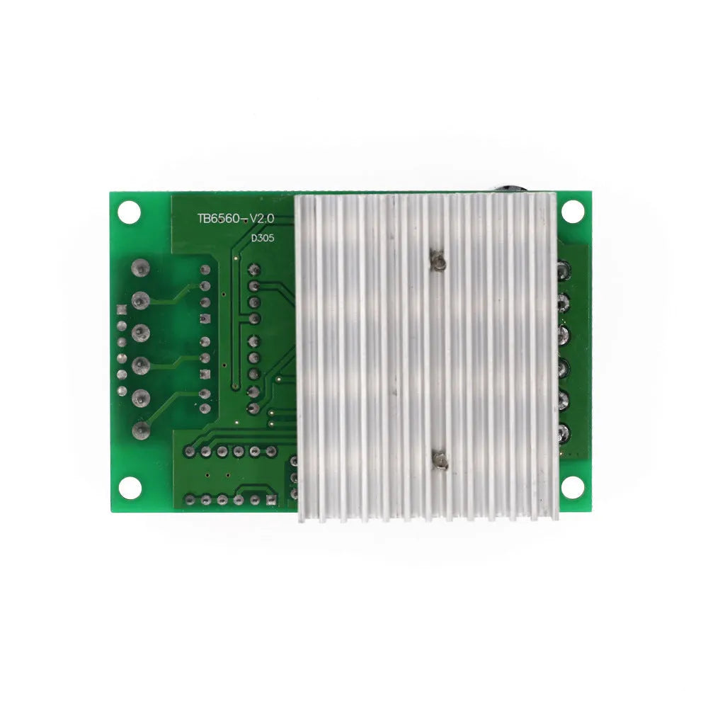 TB6560 stepper motor driver module on a green PCB with aluminium heatsink and screw terminals.