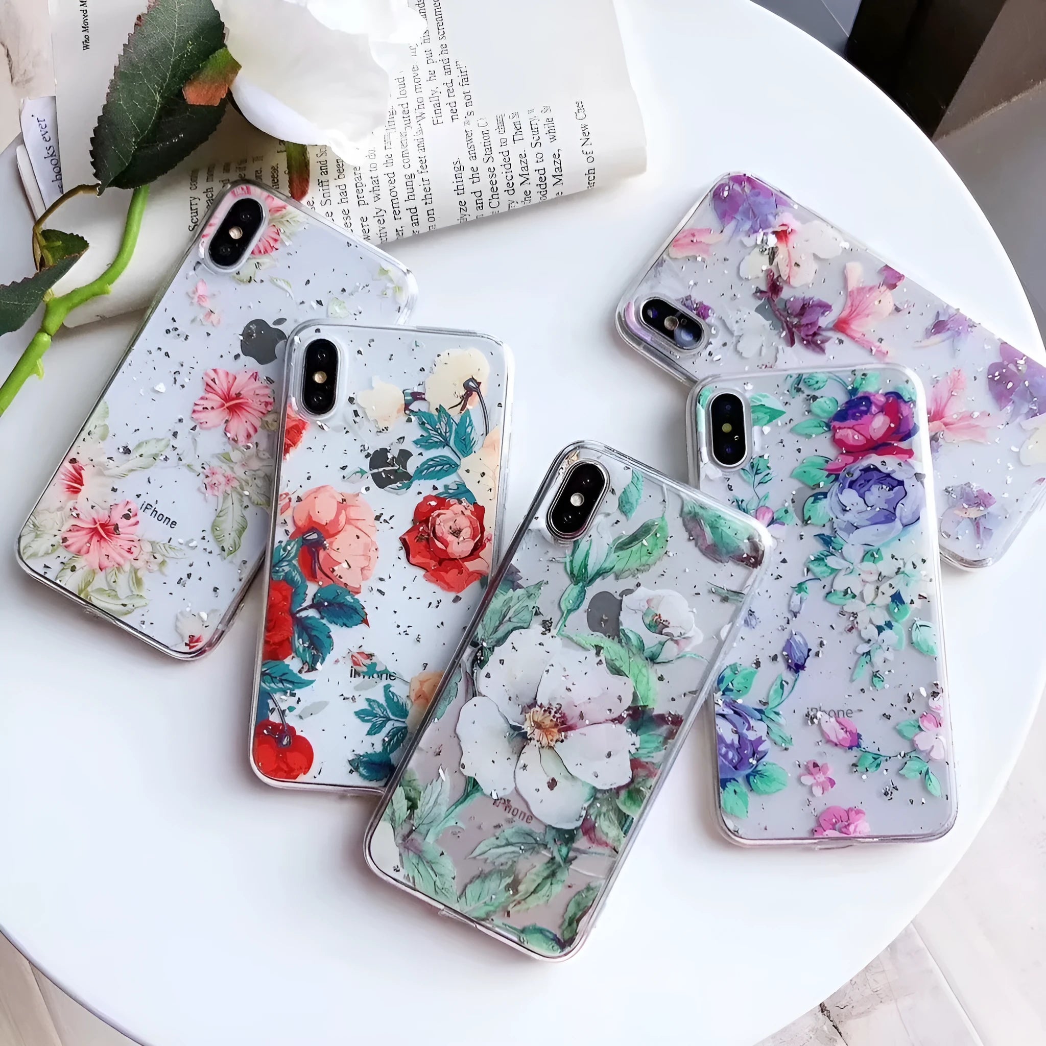 Gold foil epoxy flower pattern iPhone back cover case for iPhone 11 Pro on a table