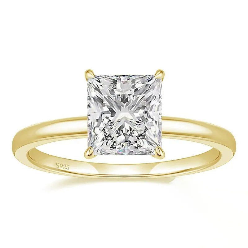 A simple geometric women's ring made of 925 silver with a round zirconium stone, shown in silver, gold, and rose gold colour options.