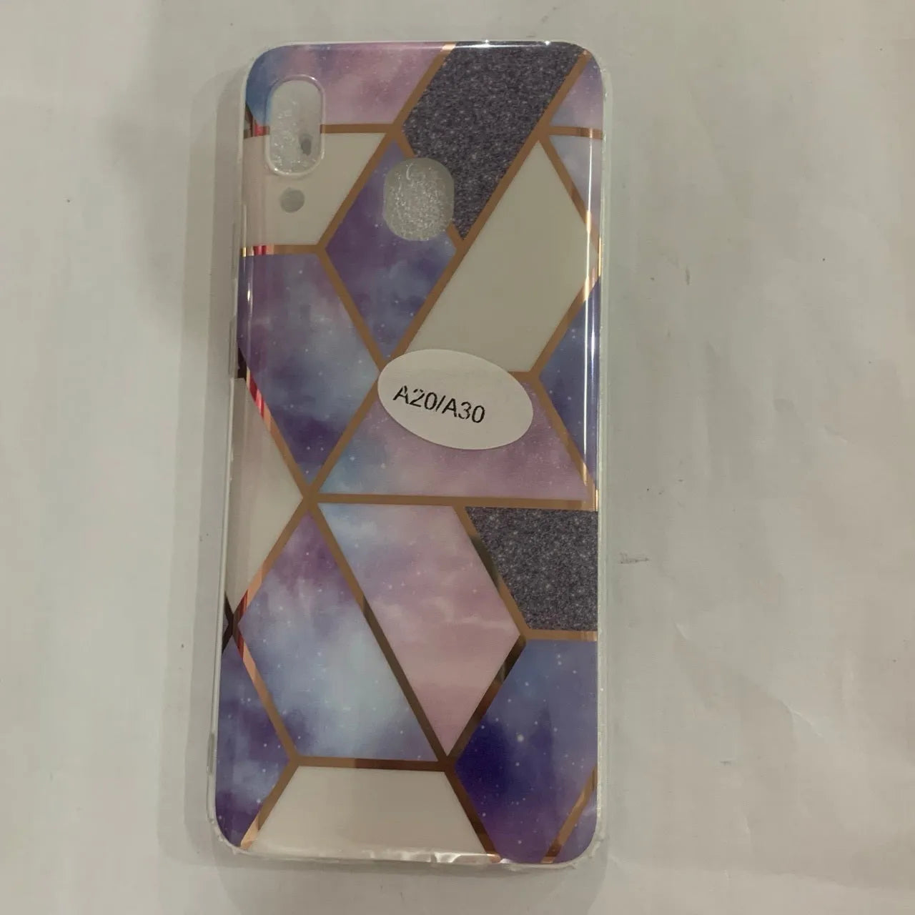 Electroplated marble pattern TPU back cover case for a Huawei or Samsung smartphone.