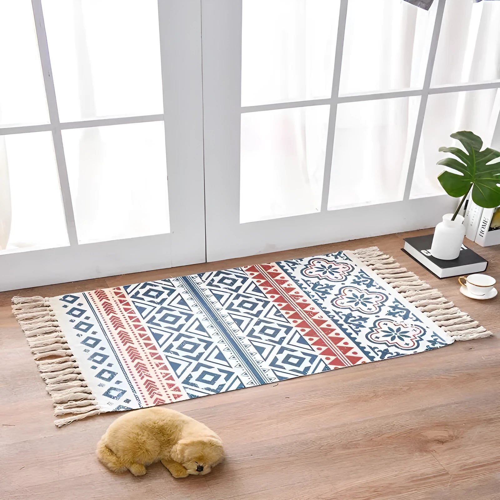 Handwoven cotton linen floor mat 60x90cm in ethnic style with natural plant dye, placed on a wooden floor