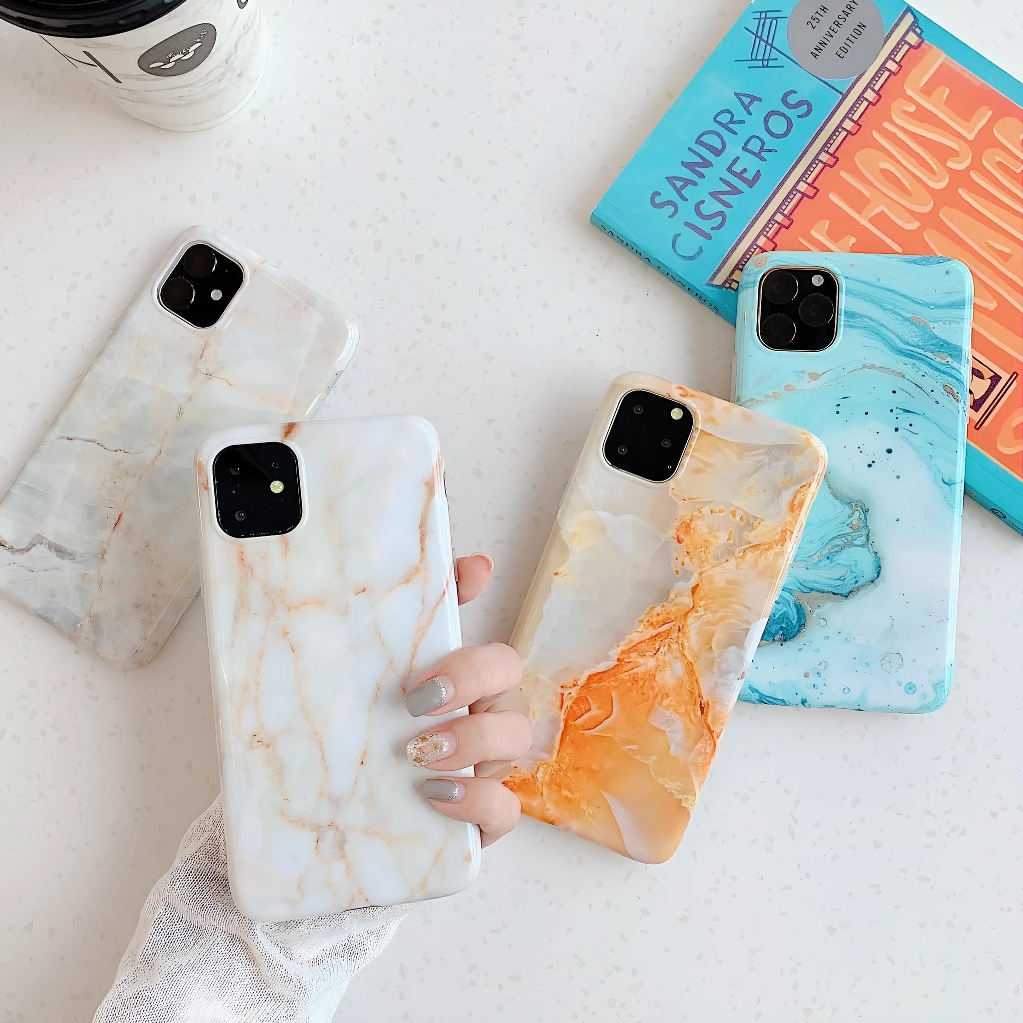 Frosty marble silicone phone case back cover with geometric pattern for iPhone models, available in multiple colours