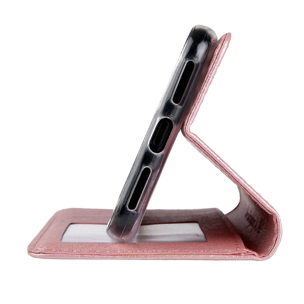Apple iPhone flip case in PU leather with card slots, shown in multiple colour options.