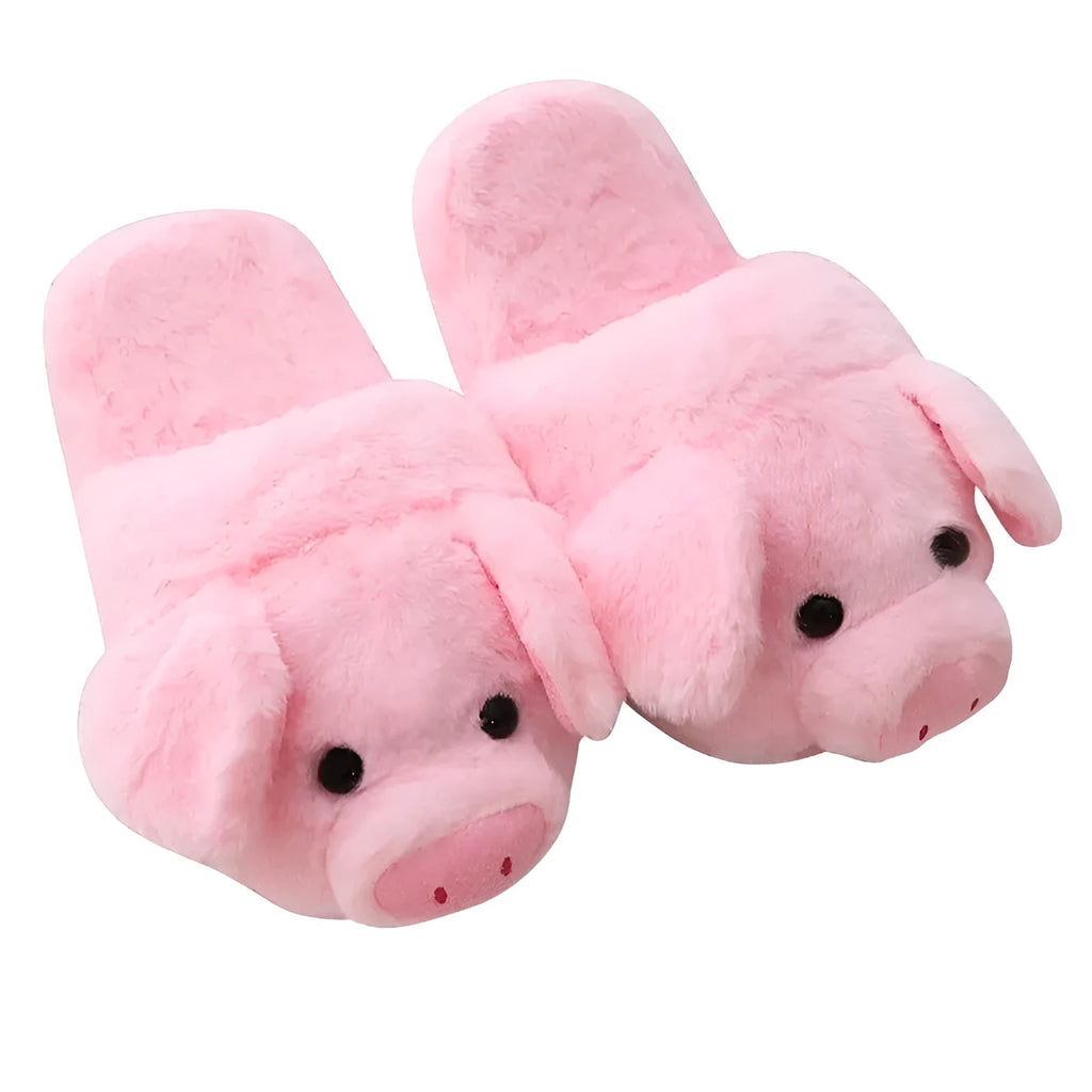 Pink pig-shaped plush floor slippers for indoor use.