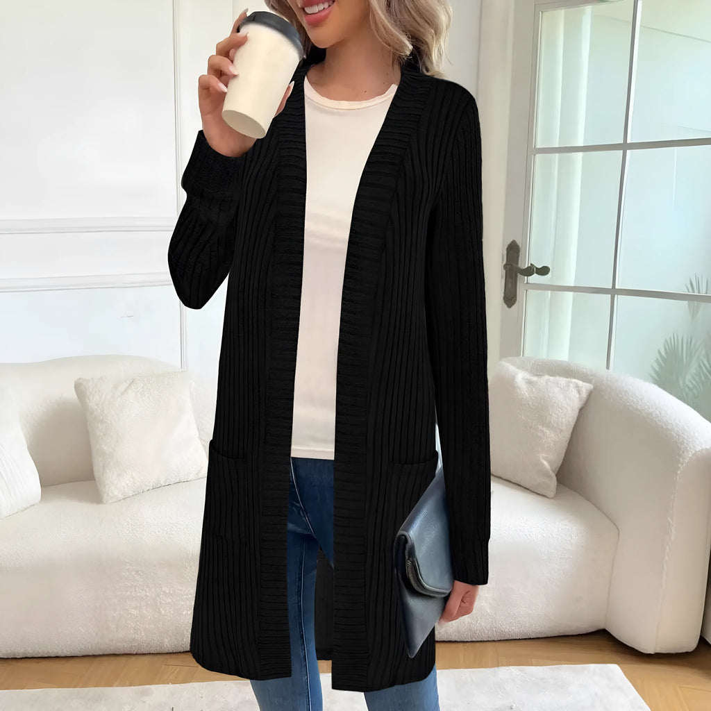 Long sleeve loose cardigan jacket in black, wine red, or grey with pockets, shown on a hanger.